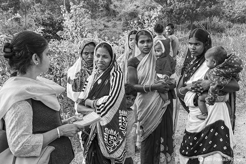 Optimizing traditional drinking water sources for accelerating change - Nandita Singh, from Södertörn University, Stockholm, Sweden interacting with the community women during her field visit in Paharia Tola, village Jhajhapara, district Dumka, Jharkhand